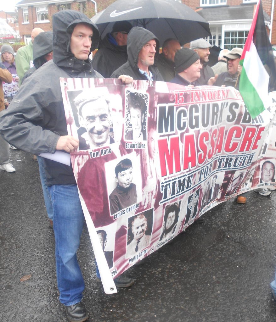 Ciarán MacAirt and other McGurk's Bar family campaigners